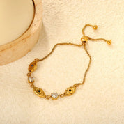 Pulsera para mujer cadena con detalles de ojito y brillo que aportan un toque especial y femenino. Joya waterproof llamativa y versátil, resistente al agua, perfecta para looks creativos y juveniles.