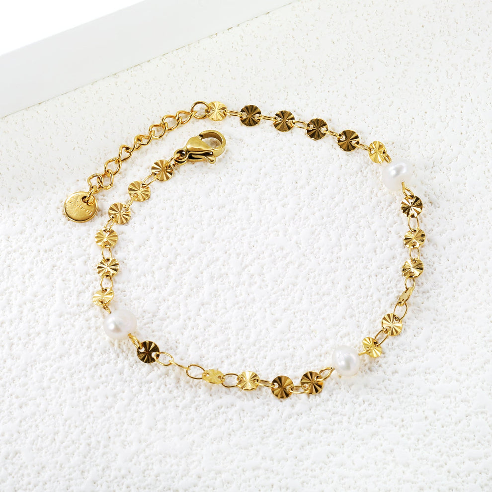 Pulsera Perla Brillante Waterproof en acero 316L enchapado en oro 18k: no se oxida, no pierde el color. Waterproof e hipoalergénico. Envío a todo el Perú.