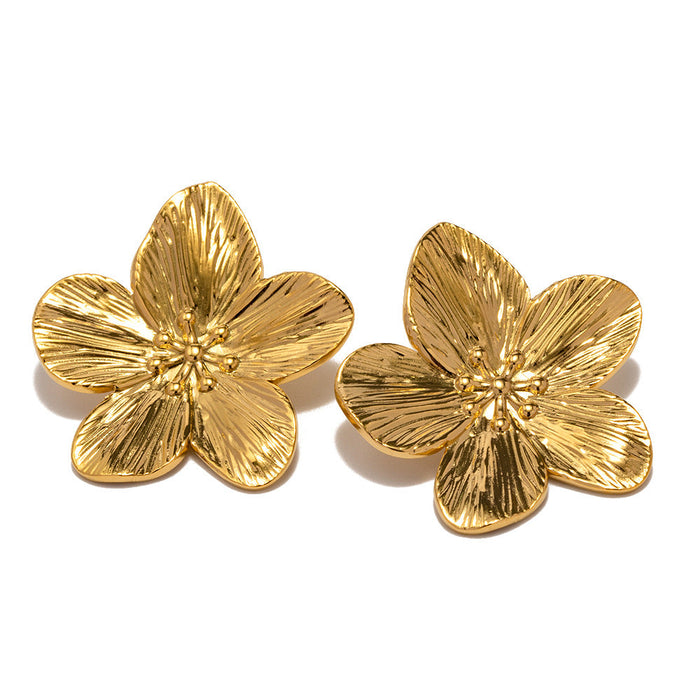 Aretes Camelia Waterproof - Joya en acero inoxidable enchapado en oro 18k - Azzia joyería