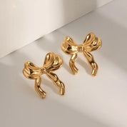 Aretes Coquette Waterproof - Joya en acero inoxidable enchapado en oro 18k - D'Merys