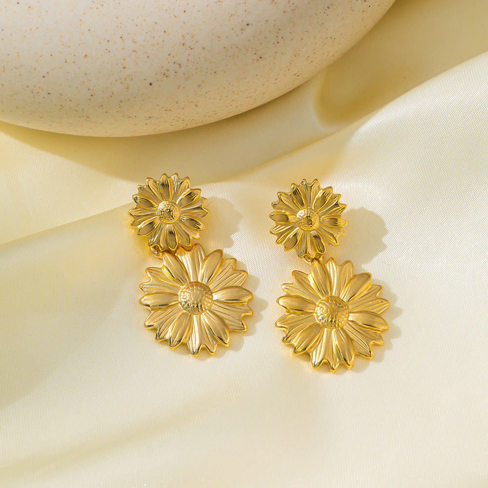 Aretes Doble Girasol Waterproof - Joya en acero inoxidable enchapado en oro 18k - Azzia joyería