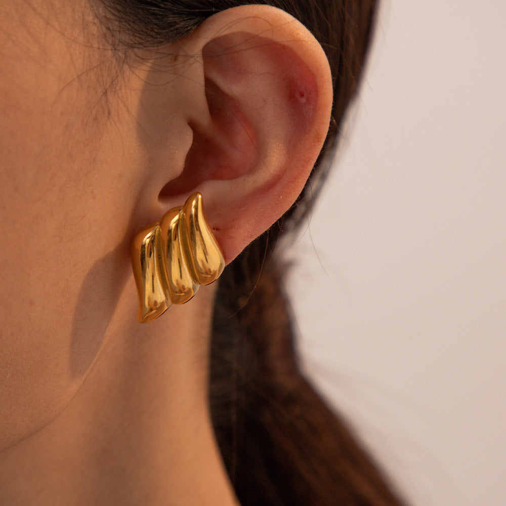 Aretes Flamma Waterproof - Joya en acero inoxidable enchapado en oro 18k - Azzia joyería