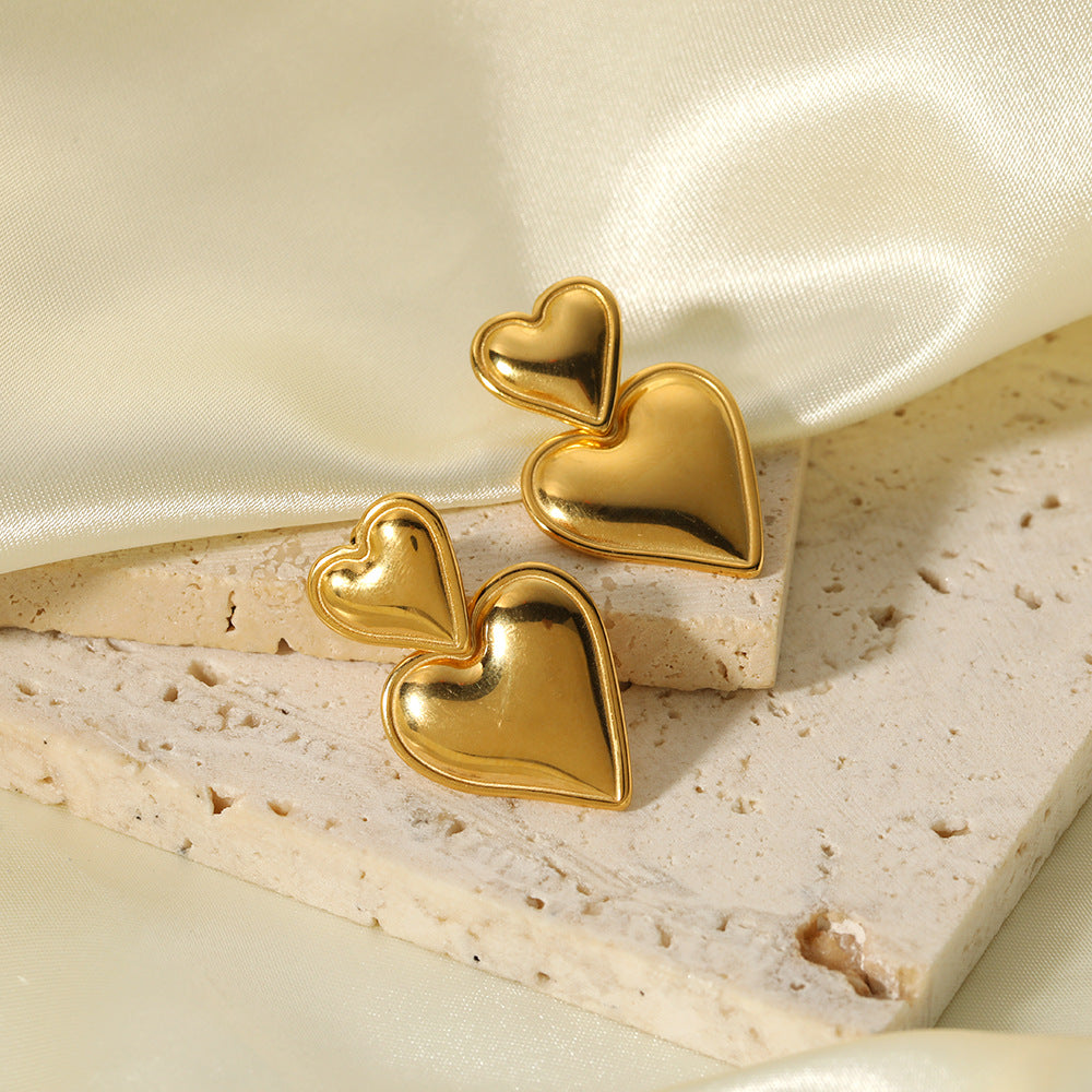Aretes Love Corazón Waterproof - Joya en acero inoxidable enchapado en oro 18k - D'Merys