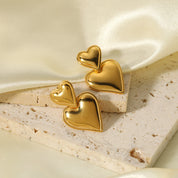 Aretes Love Corazón Waterproof - Joya en acero inoxidable enchapado en oro 18k - D'Merys