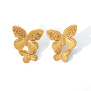 Aretes Lucia Mariposa Waterproof - Joya en acero inoxidable enchapado en oro 18k - D'Merys