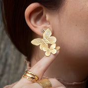 Aretes Lucia Mariposa Waterproof - Joya en acero inoxidable enchapado en oro 18k - D'Merys
