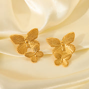Aretes Lucia Mariposa Waterproof - Joya en acero inoxidable enchapado en oro 18k - D'Merys