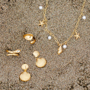 Aretes Ocean Waterproof - Joya en acero inoxidable enchapado en oro 18k - D'Merys