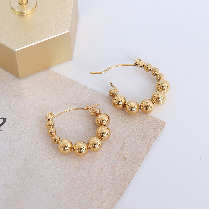 Argollas Billas Doradas Waterproof - Joya en acero inoxidable enchapado en oro 18k - D'Merys