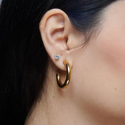 Argollas Cecilia Entubadas Waterproof - Joya en acero inoxidable enchapado en oro 18k - D'Merys