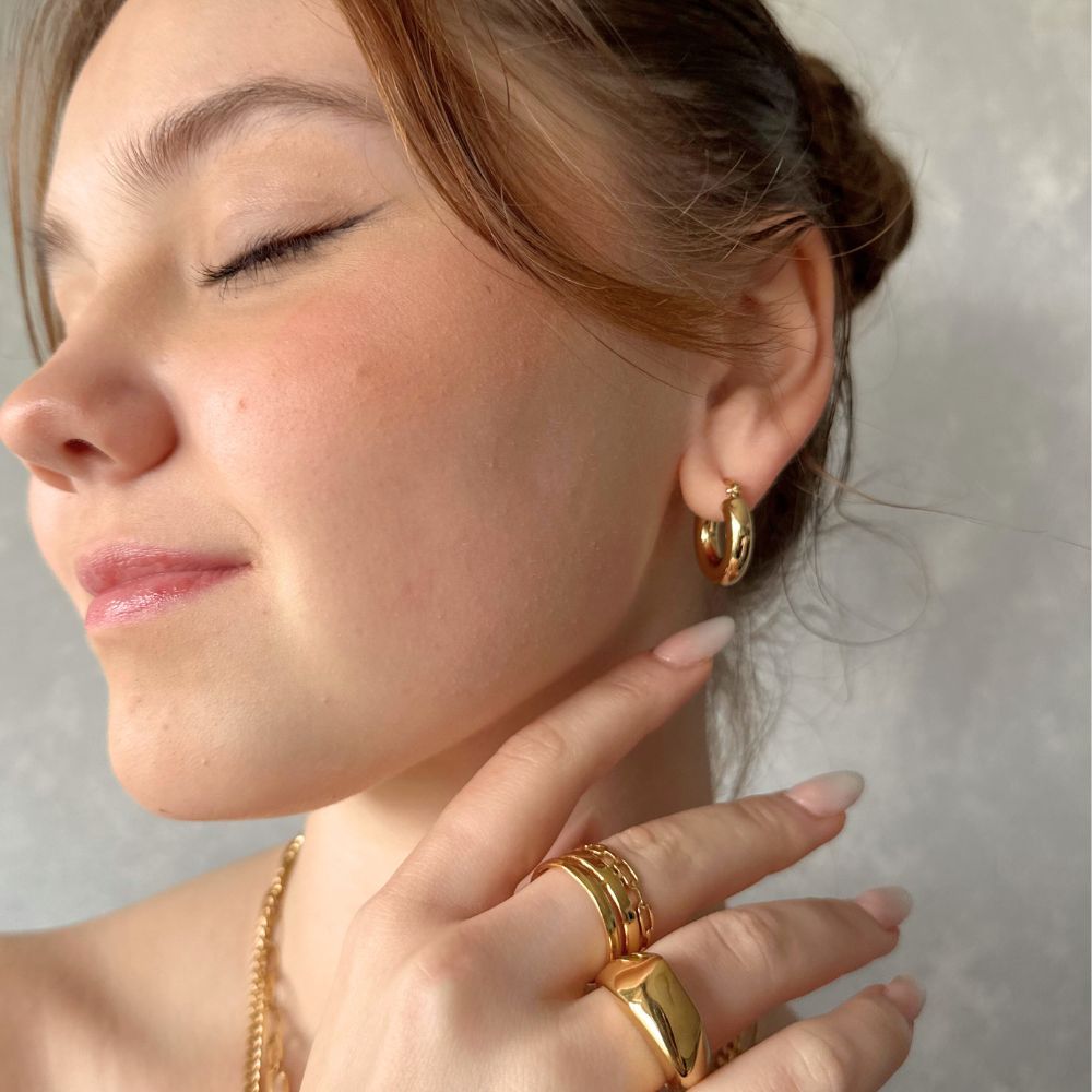 Argollas Clásicas Entubadas Waterproof - Joya en acero inoxidable enchapado en oro 18k - D'Merys