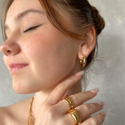 Argollas Clásicas Entubadas Waterproof - Joya en acero inoxidable enchapado en oro 18k - D'Merys