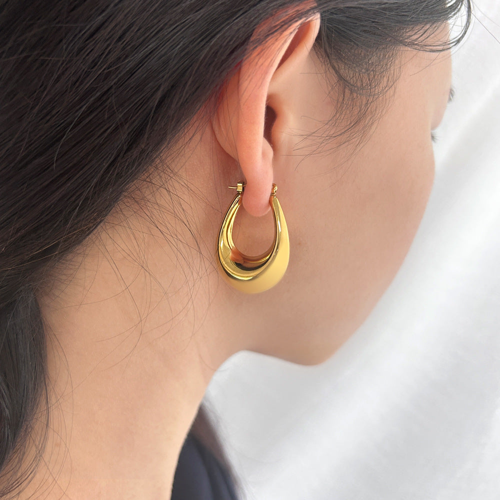 Argollas Olinda Waterproof - Joya en acero inoxidable enchapado en oro 18k - D'Merys