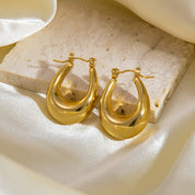 Argollas Olinda Waterproof - Joya en acero inoxidable enchapado en oro 18k - D'Merys