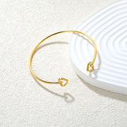 Pulsera de corazón abierta para mujer en acero inoxidable dorado - Azzia