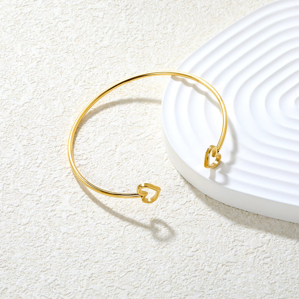 Pulsera de corazón abierta para mujer en acero inoxidable dorado - Azzia