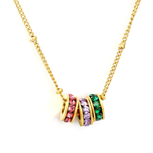 Collar para mujer con dijes circulares de colores que aportan luz, frescura y un toque divertido a cualquier look. Joya waterproof llamativa y femenina, resistente al agua.