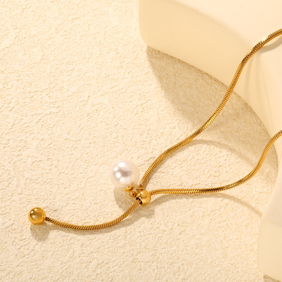Collar Alegra Perla Waterproof: Elegancia minimalista con perla en acero inoxidable. Resistente al agua. Sutil y sofisticado para cualquier ocasión.