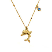 Collar Delfín Blue Waterproof: Elegancia acuática en acero inoxidable con dije de delfín y circón azul, enchapado en oro 18k. ¡Ideal para brillar! En Azzia