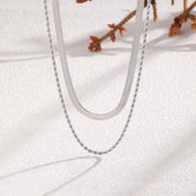 Collar Doble Fátima, sofisticación impermeable con cadena snake y cordón dorado. Ideal para un estilo diario único y elegante. ¡Azzia Joyería!