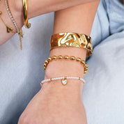 Pulsera bolitas doradas delicada y elegante - AZZIA JOYERIA 
