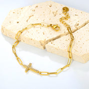 Pulsera Cruz Eslabones Waterproof en acero 316L enchapado en oro 18k: no se oxida, no pierde el color. Waterproof e hipoalergénico. Envío a todo el Perú.