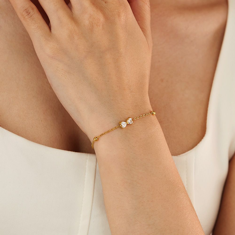 Pulsera Moño Circón para mujer tipo hilo fino en dorado, waterproof delicada y femenina. -  AZZIA JOYERIA 