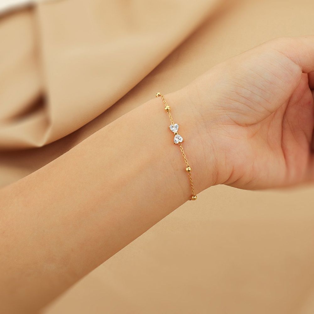 Pulsera Moño Circón para mujer tipo hilo fino en dorado, waterproof delicada y femenina. -  AZZIA JOYERIA