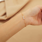 Pulsera Moño Circón para mujer tipo hilo fino en dorado, waterproof delicada y femenina. -  AZZIA JOYERIA