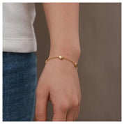 Pulsera Karina Waterproof en acero 316L enchapado en oro 18k: no se oxida, no pierde el color. Waterproof e hipoalergénico. Envío a todo el Perú.
