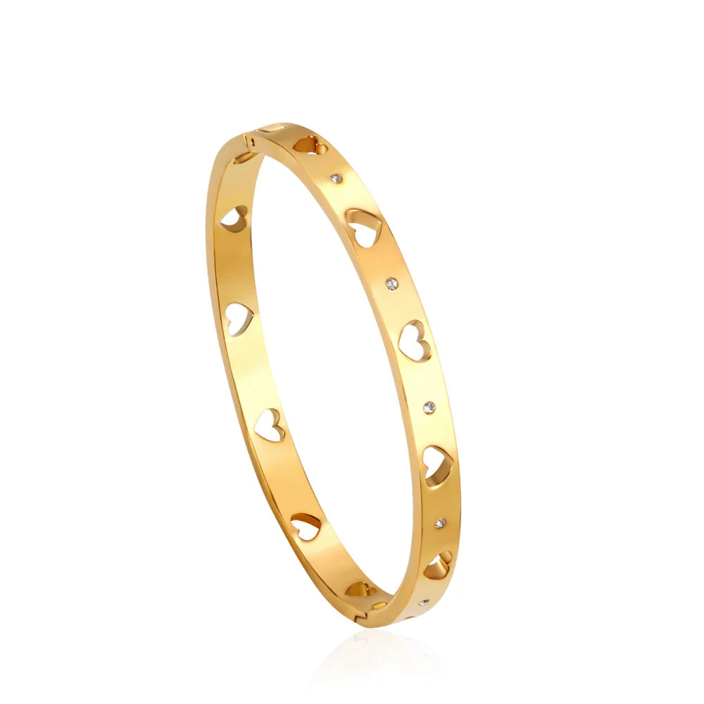 Puñera Corazón Calado Waterproof - Joya en acero inoxidable enchapado en oro 18k - D'Merys