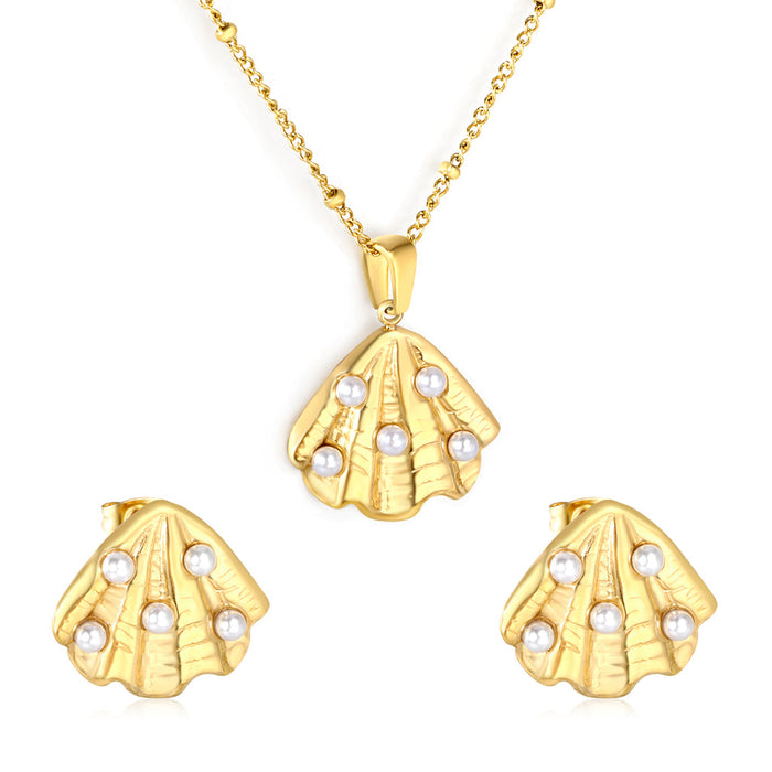 Set de collar y Aretes, conchitas de mar doradas - AZZIA JOYERIA 